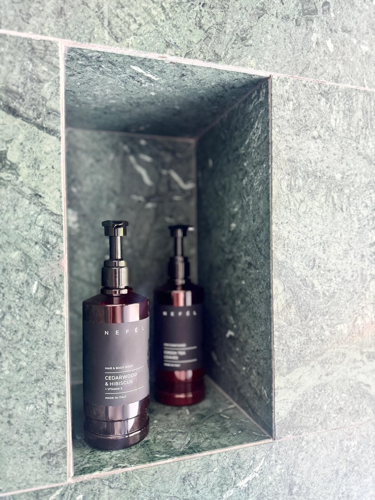 junior suite, lake view (veranda) | bathroom | shower, rainfall showerhead, hair dryer, slippers