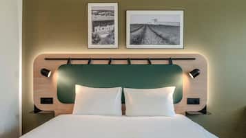 Luxe beddengoed, een bureau, verduisterende gordijnen, gratis wifi