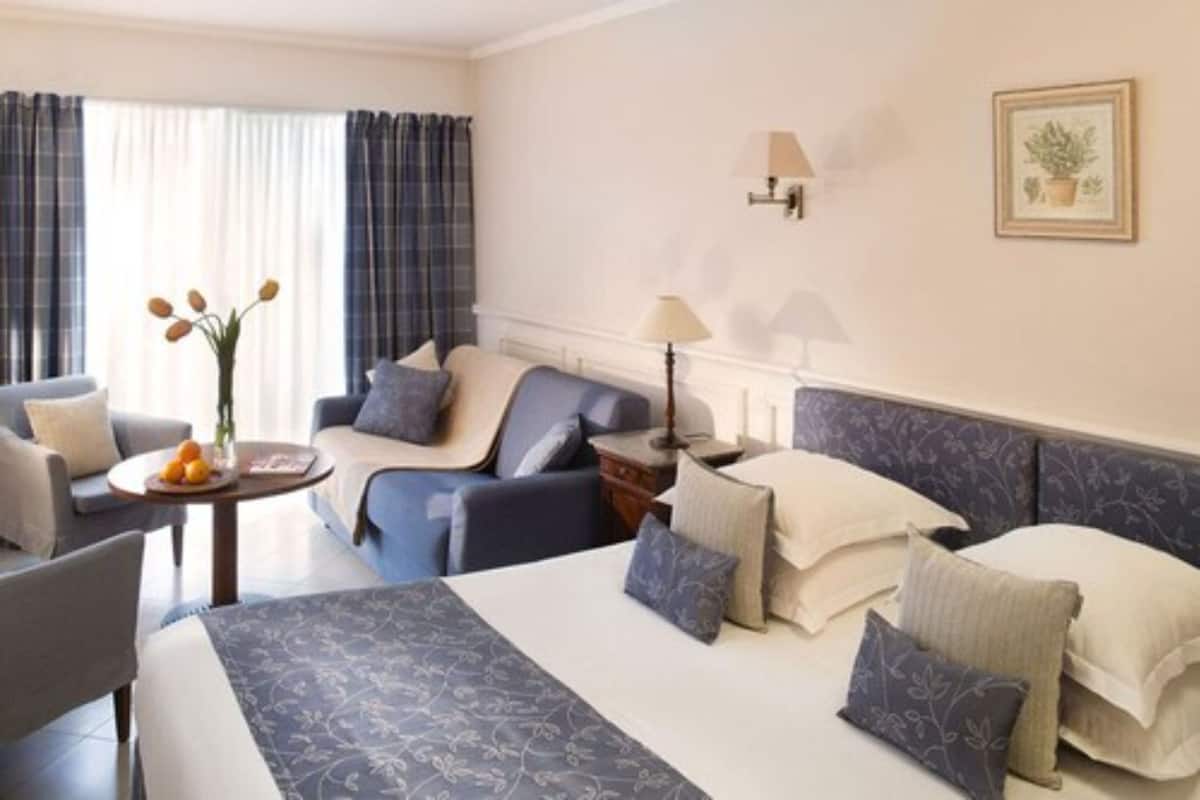Luxe beddengoed, een kluis op de kamer, een bureau