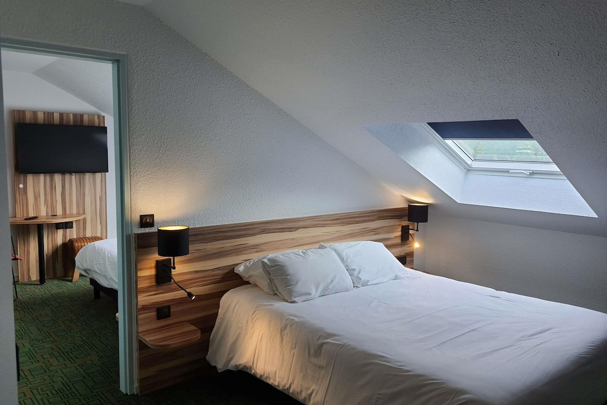 premium bedding, select comfort beds, desk, laptop workspace