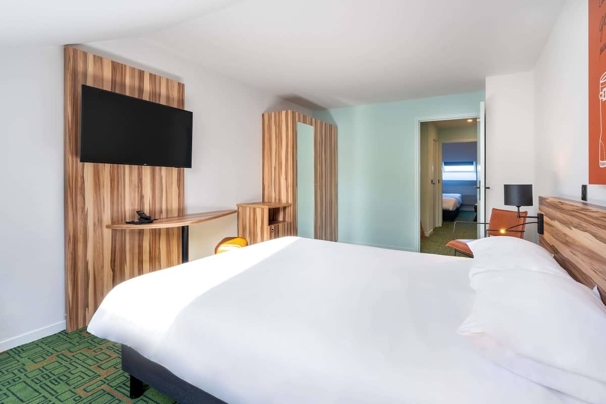 premium bedding, select comfort beds, desk, laptop workspace