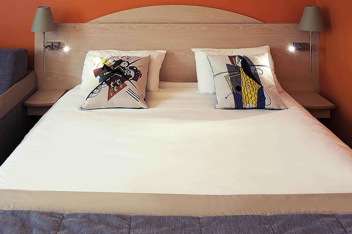 premium bedding, select comfort beds, desk, laptop workspace