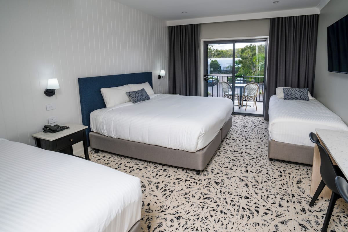 Desk, laptop workspace, blackout curtains, iron/ironing board