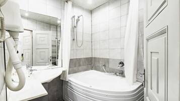Bathtub, deep soaking tub, free toiletries, hair dryer