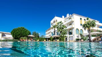 2 outdoor pools, pool umbrellas, pool loungers