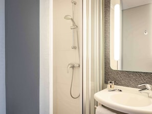 Shower, eco-friendly toiletries, hair dryer, towels