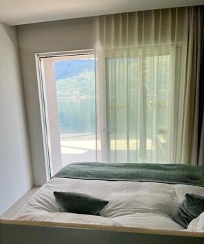 Luxury Suite, Balcony, Lake View | In-room safe, Internet, alarm clocks - Boutique Hotel La Rocca (Ronco sopra Ascona)