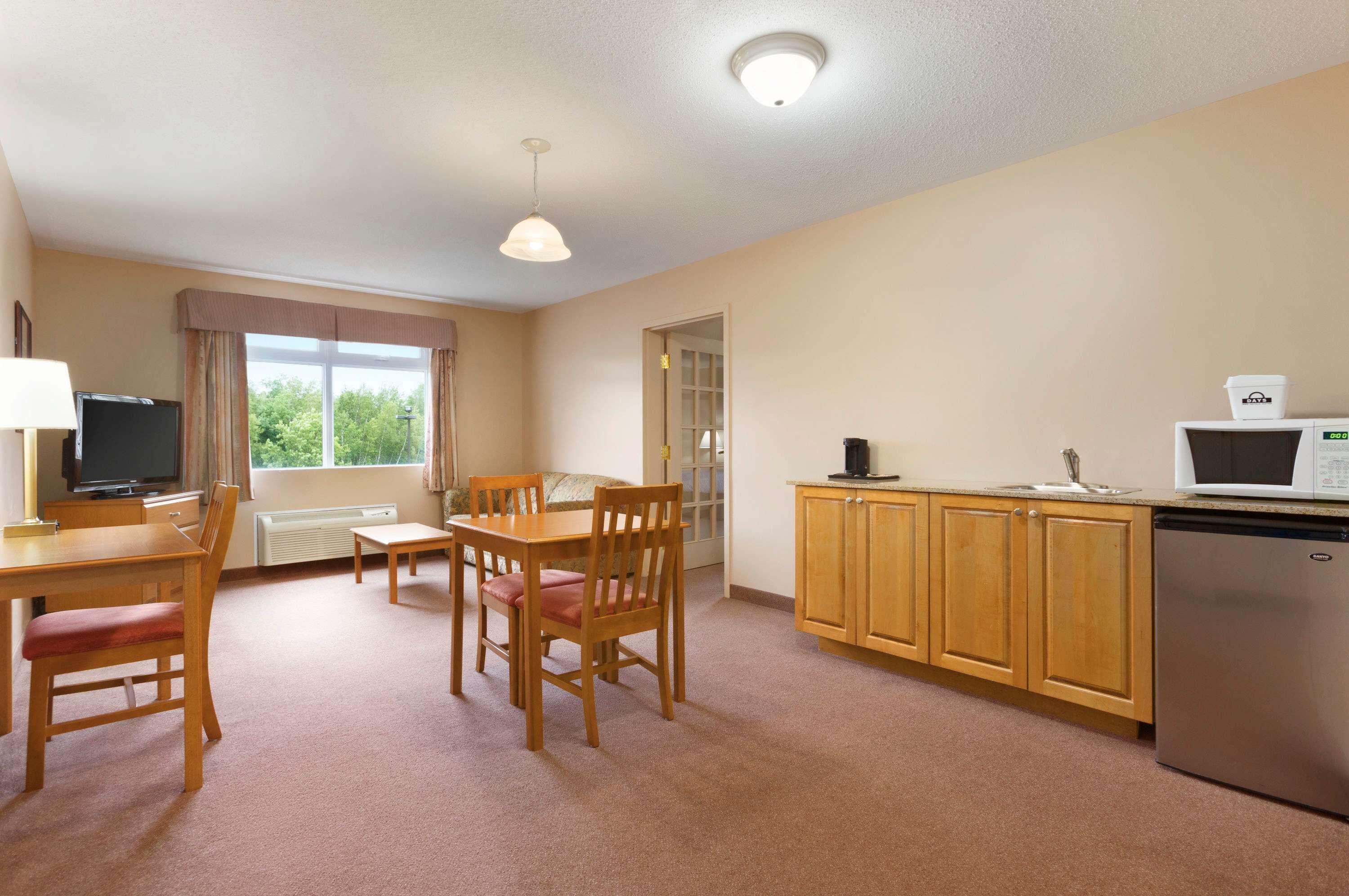 family suite | in-room safe, desk, iron/ironing board, cots/infant beds