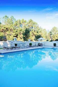 Seasonal outdoor pool, sun loungers at Fairfield Inn & Suites Charleston North/Ashley Phosphate