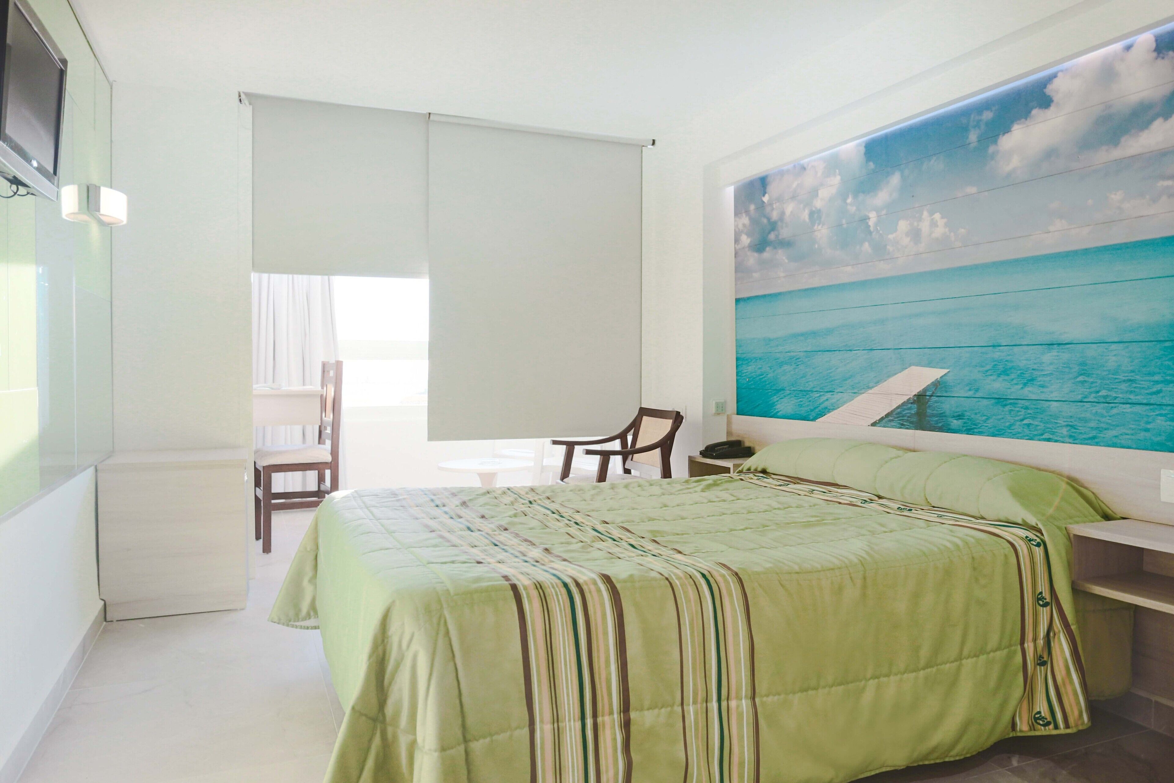 economy room | minibar, desk, free wifi, bed sheets