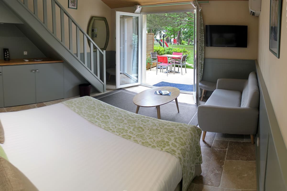 Family Room, Terrace | 1 bedroom, in-room safe, individually furnished, desk