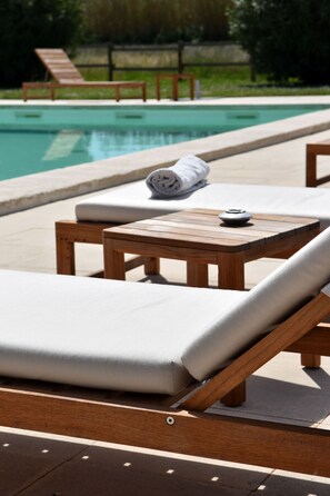 Seasonal outdoor pool, free pool cabanas, pool umbrellas