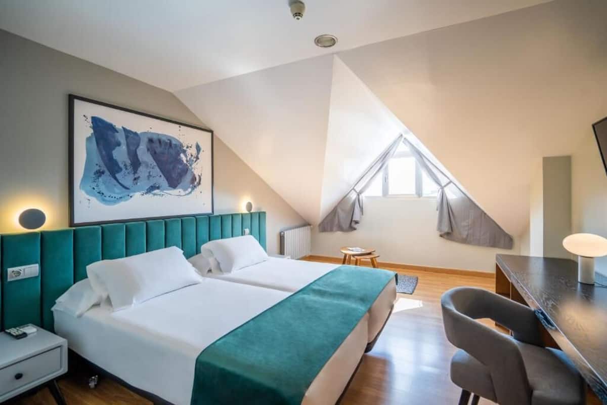 Hypo-allergenic bedding, minibar, in-room safe, desk