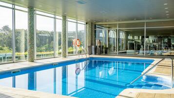 Swim surrounded by breathtaking views of the surrounding landscape from this expansive indoor pool.