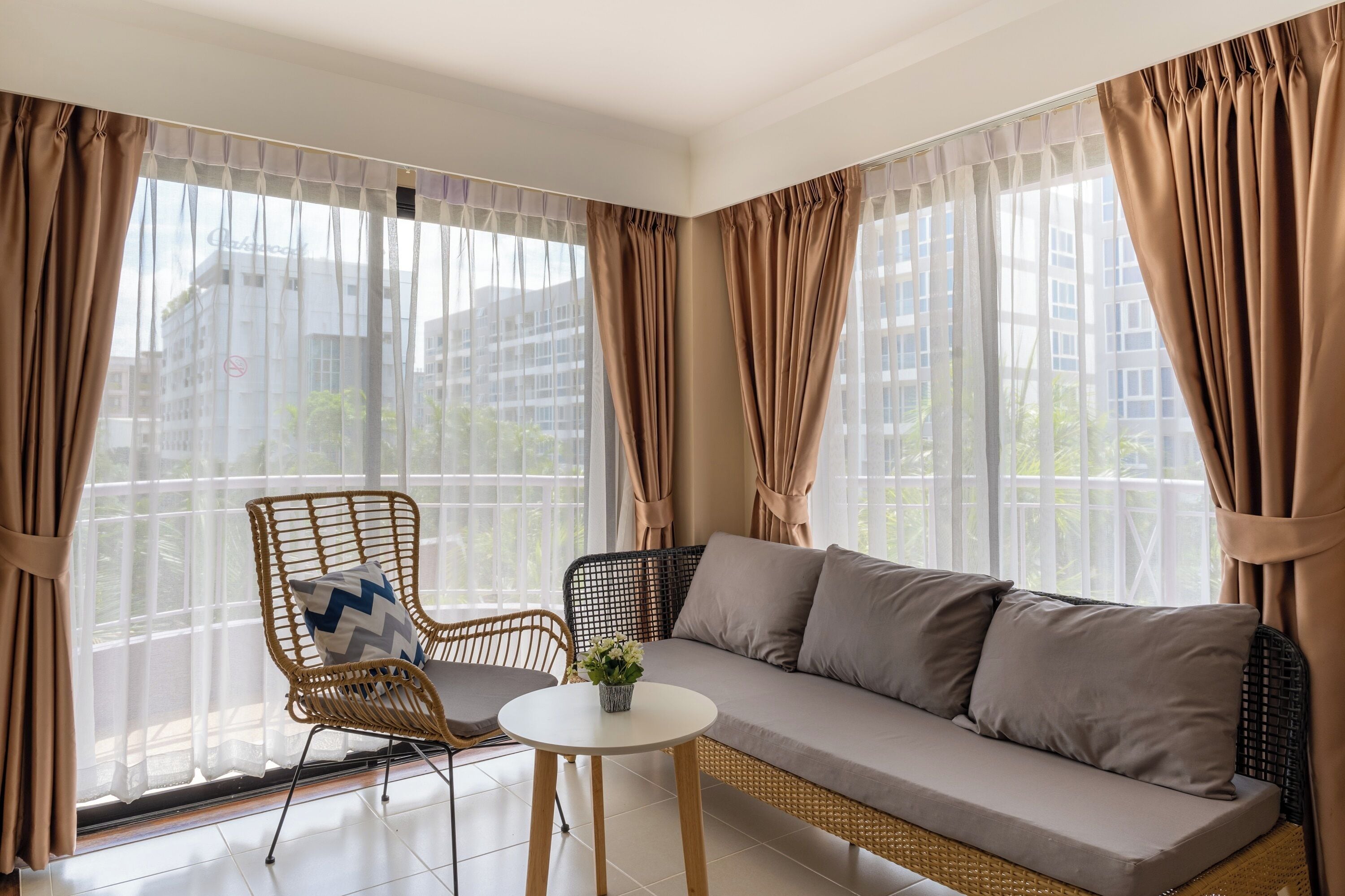 Corner Suite with Balcony | Living area | Flat-screen TV