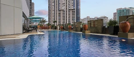 Outdoor pool, pool umbrellas, sun loungers