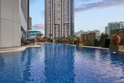 Outdoor pool, pool umbrellas, sun loungers
