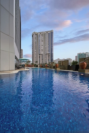 Outdoor pool, pool umbrellas, sun loungers