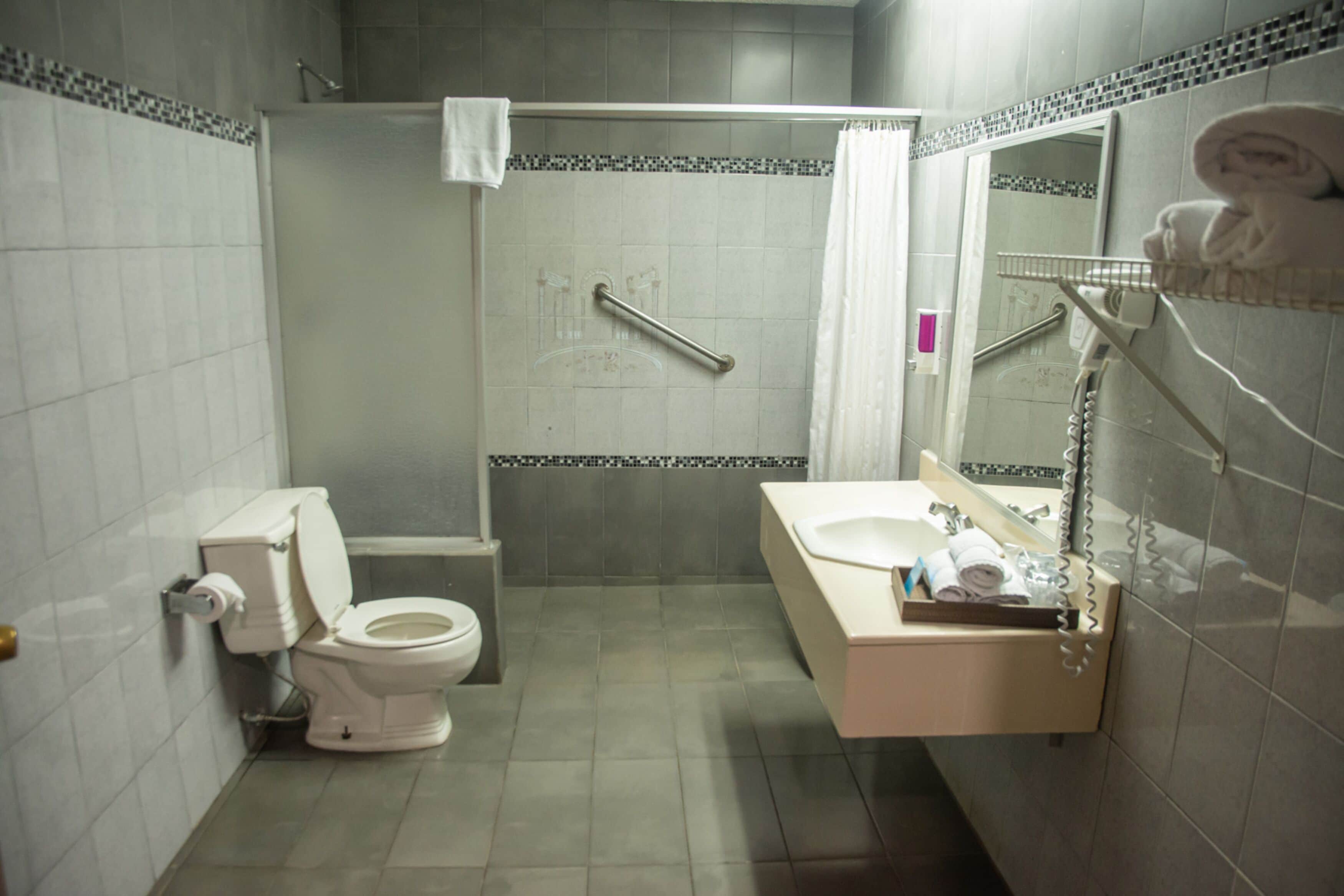 shower, eco-friendly toiletries, hair dryer, towels