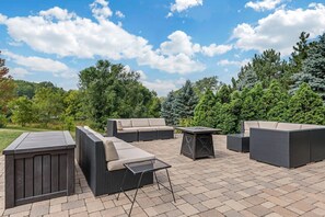 Indoor pool, open 8:00 AM to 9:00 PM, pool loungers