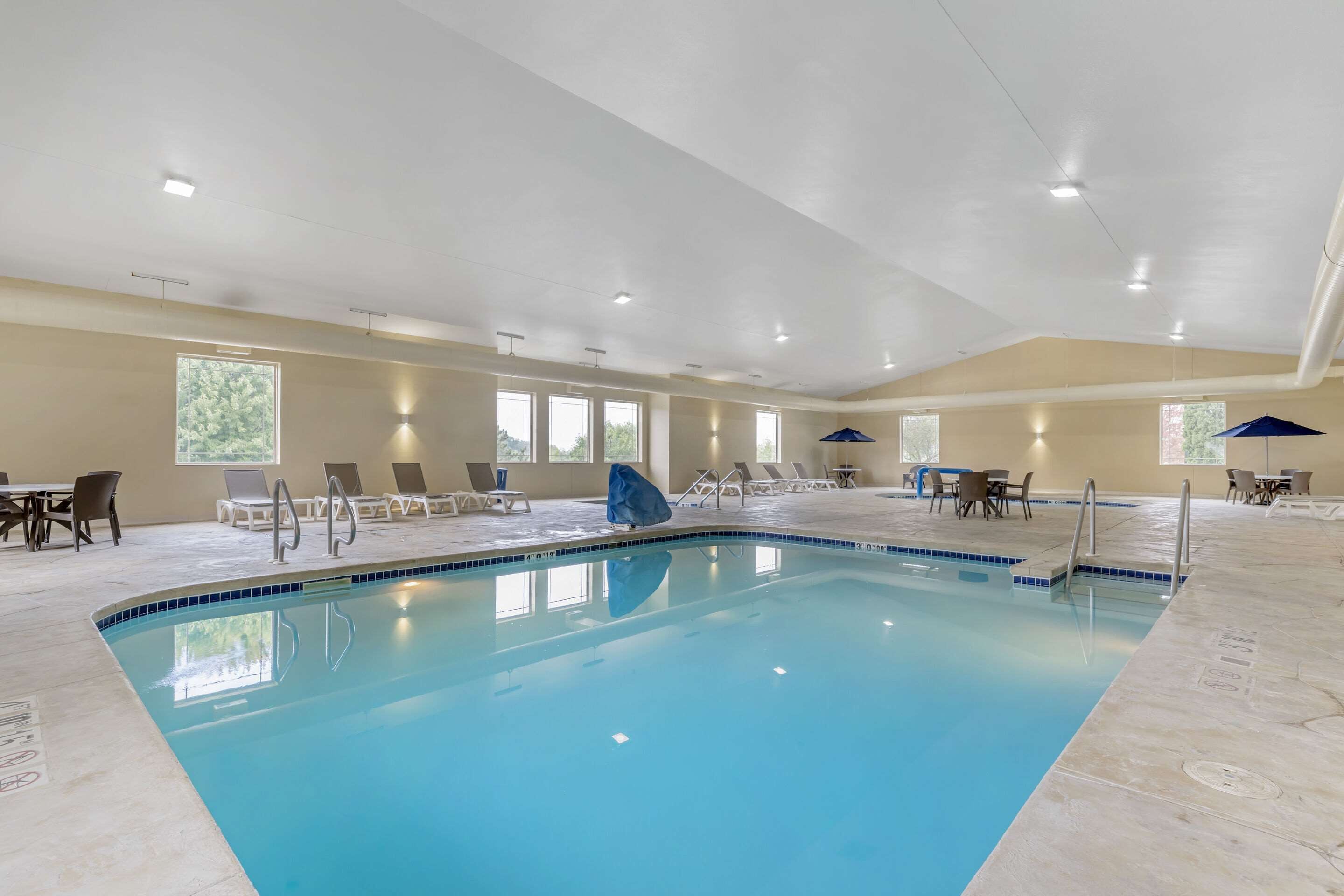indoor pool, open 8:00 am to 9:00 pm, pool loungers