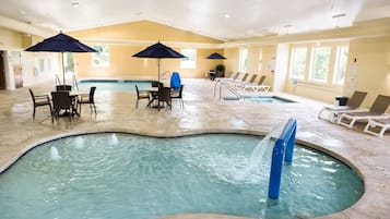 Indoor pool, open 8:00 AM to 9:00 PM, pool loungers