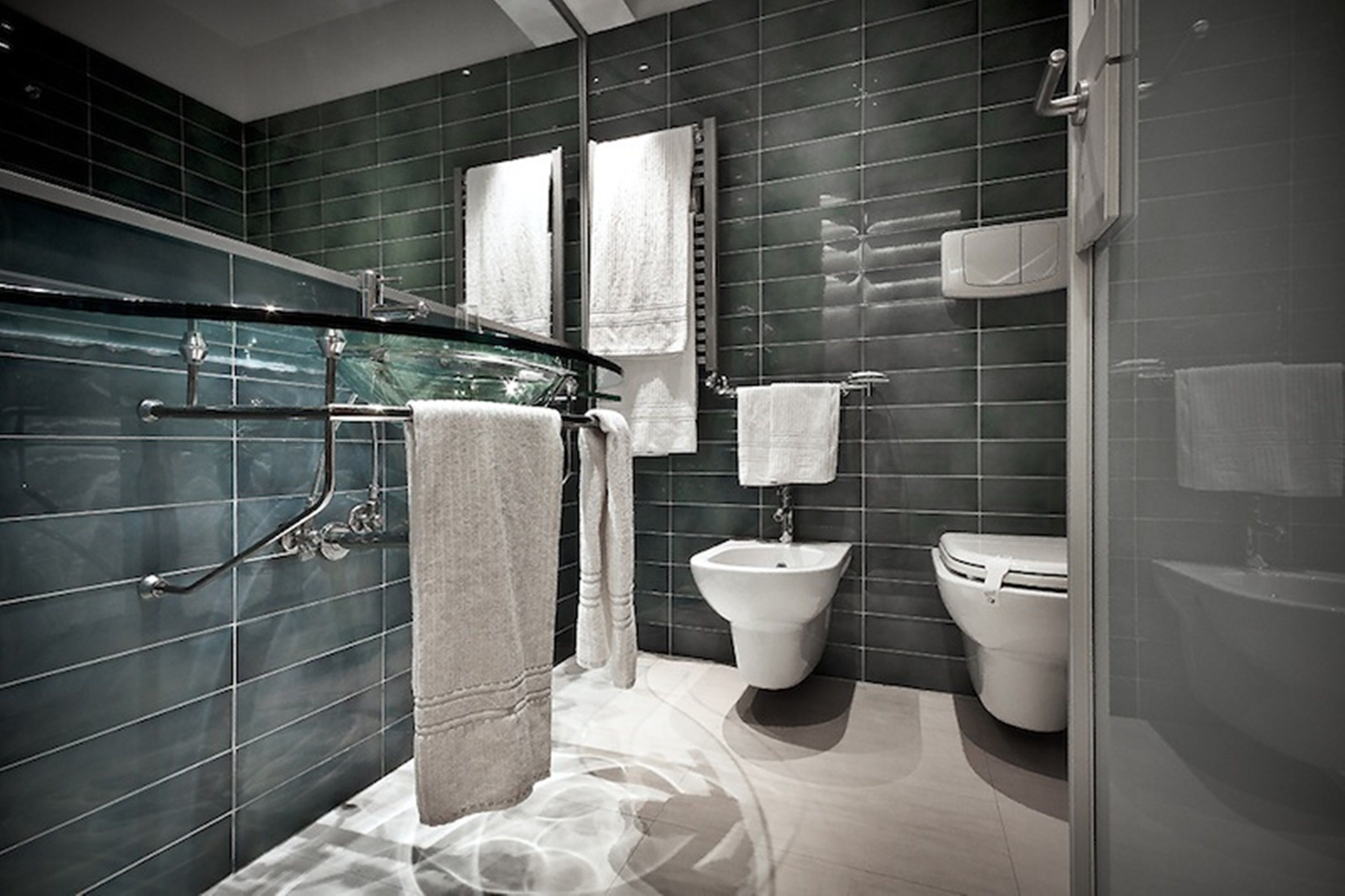 free toiletries, hair dryer, bidet, towels