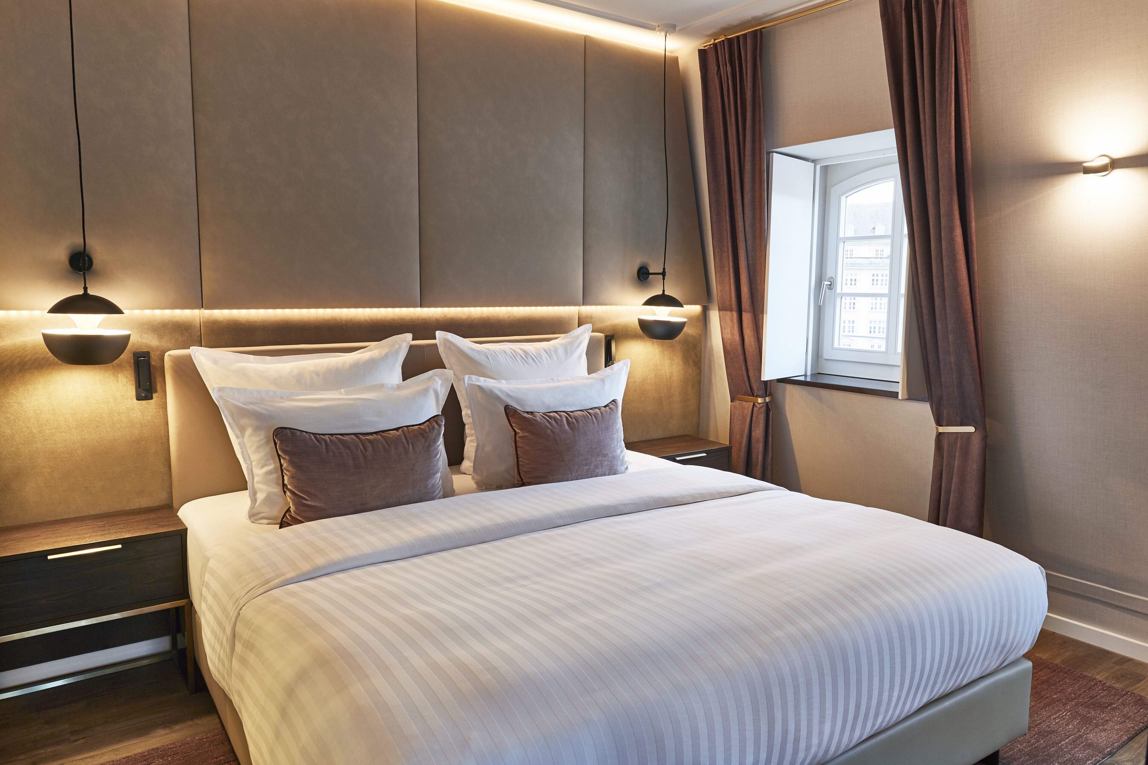 hypo-allergenic bedding, down duvets, in-room safe, desk