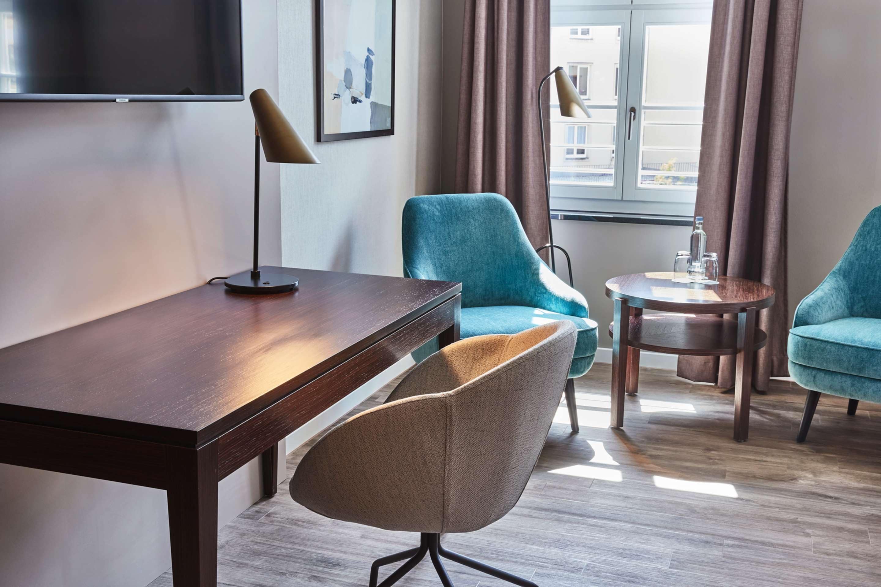 hypo-allergenic bedding, down duvets, in-room safe, desk