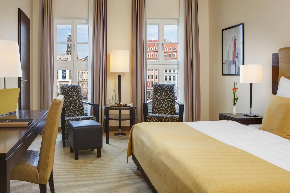 Hypo-allergenic bedding available, down comforters, in-room safe, desk