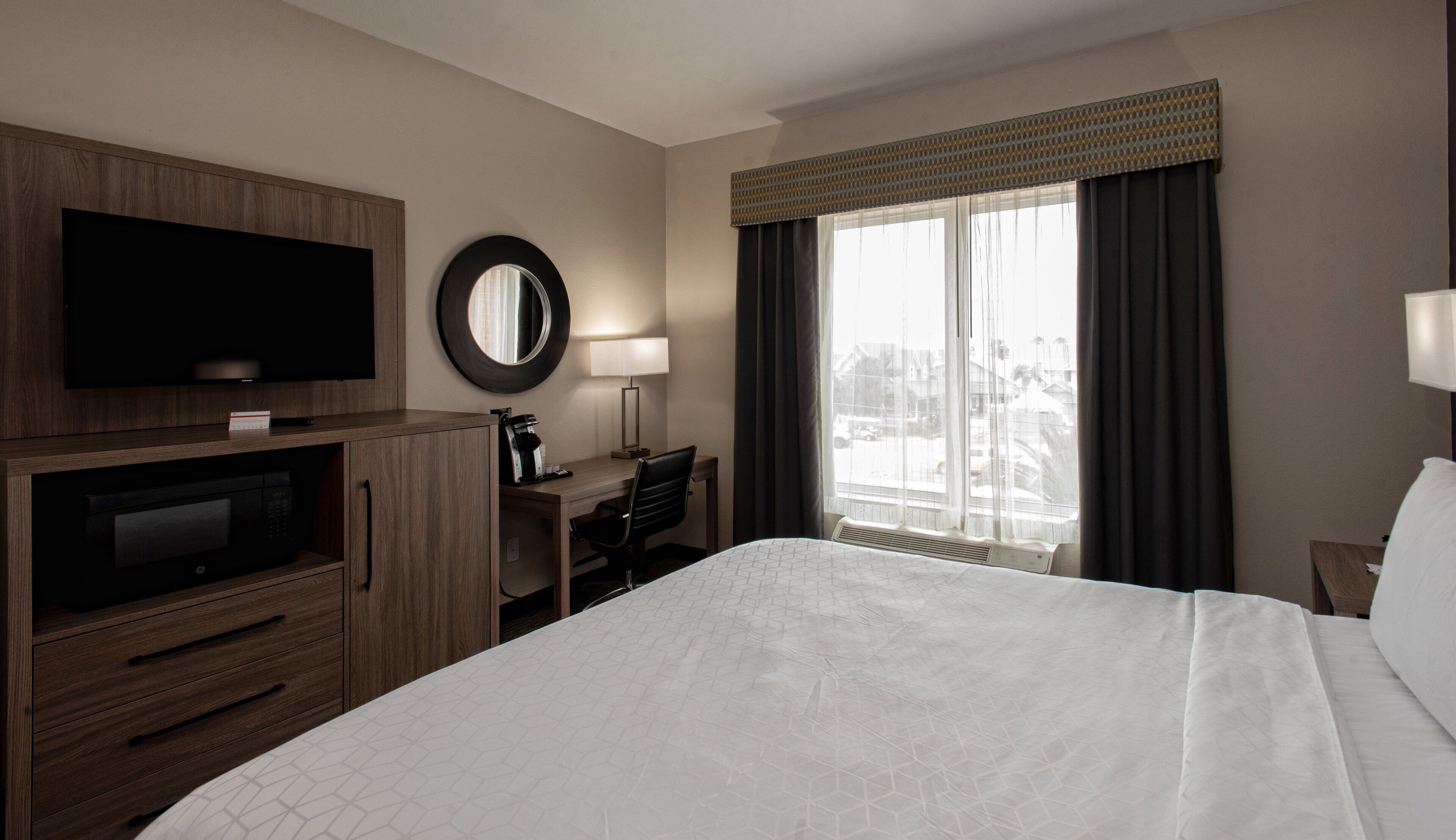 desk, laptop workspace, iron/ironing board, free cots/infant beds