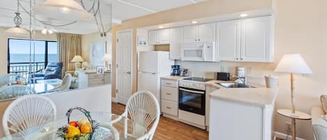 Senior Condo, 1 King Bed with Sofa bed | Private kitchen | Fridge, microwave, stovetop, coffee/tea maker