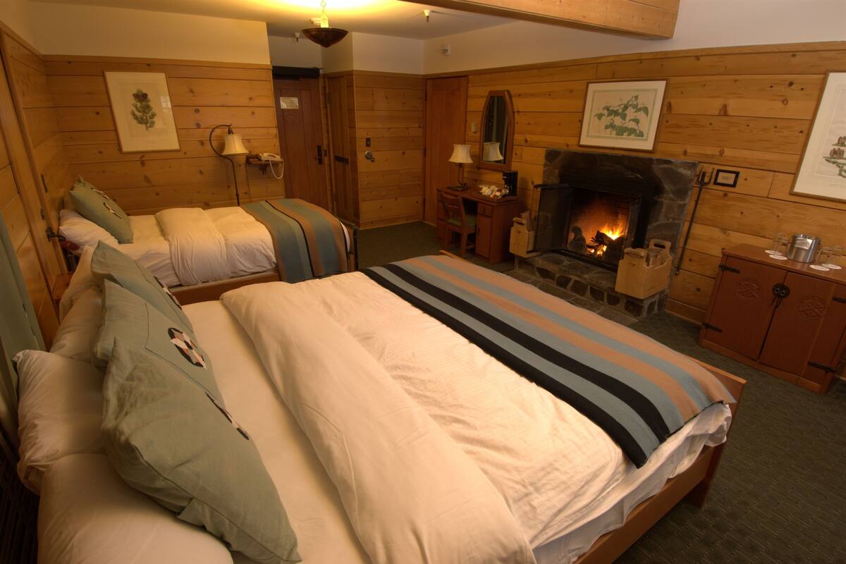 King Fireplace with Twin | Down comforters, pillowtop beds, in-room safe, individually decorated