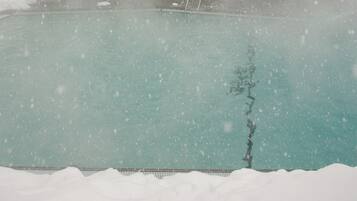 Outdoor pool, open 9 AM to 11 PM, sun loungers