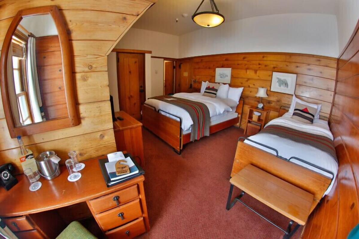 Queen with Twin | Down comforters, pillowtop beds, in-room safe, individually decorated