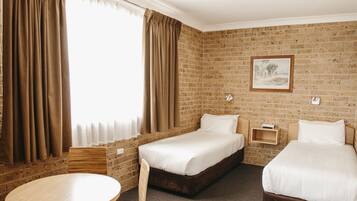 Family Room | Iron/ironing board, WiFi (free), bed sheets