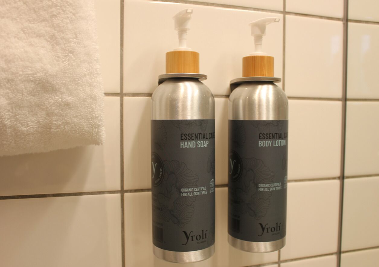 shower, designer toiletries, hair dryer, towels