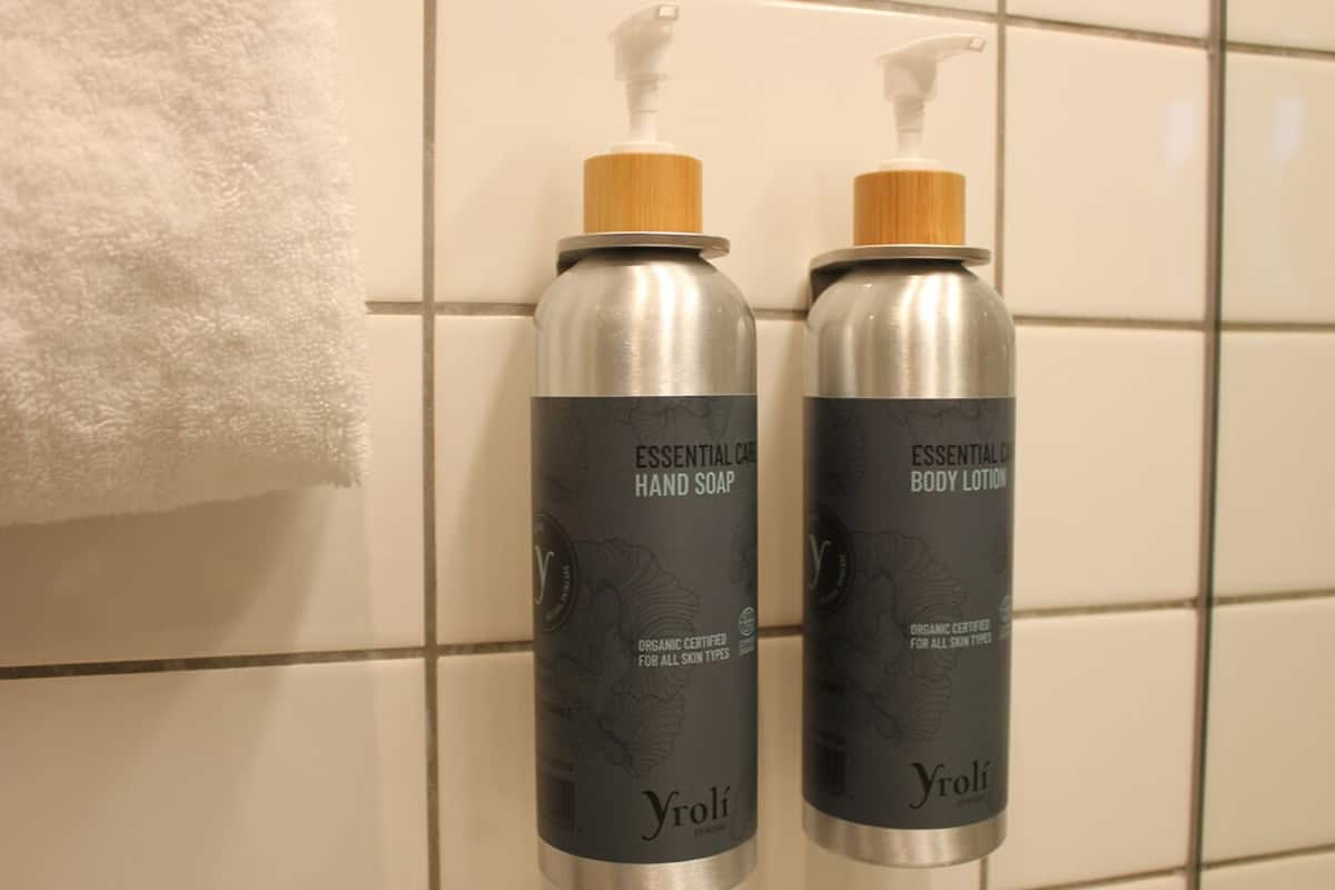 shower, designer toiletries, hair dryer, towels