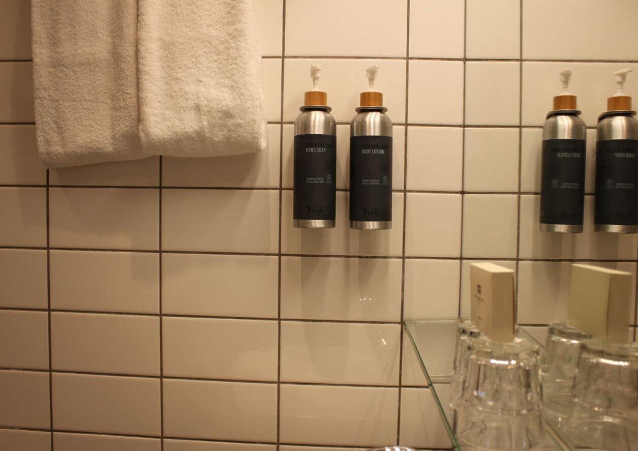shower, designer toiletries, hair dryer, towels
