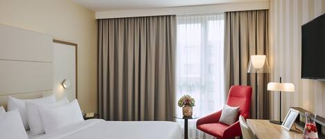 Premium bedding, pillowtop beds, minibar, in-room safe