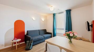 Apartment, 1 Bedroom | Living area | TV