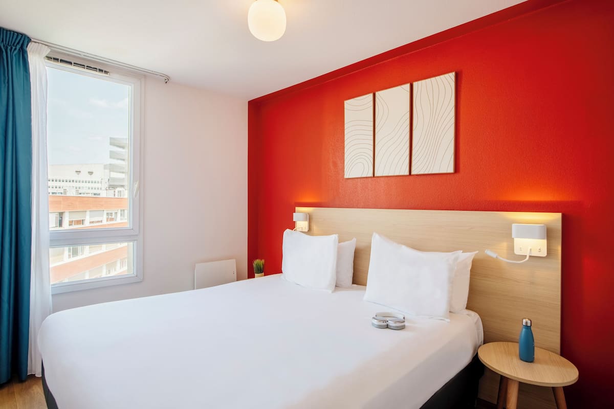 Apartment, 1 Bedroom | In-room safe, desk, soundproofing, iron/ironing board