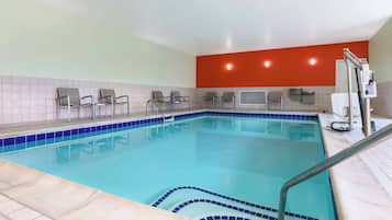 Indoor pool, open 6:00 AM to 11:00 PM, pool loungers