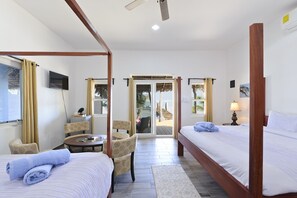 Panoramic Room | Living area | LED TV - Parrot Cove Lodge (Hopkins)