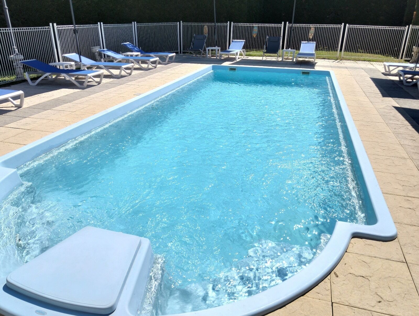 seasonal outdoor pool, open 10:30 am to 5:30 pm, pool umbrellas