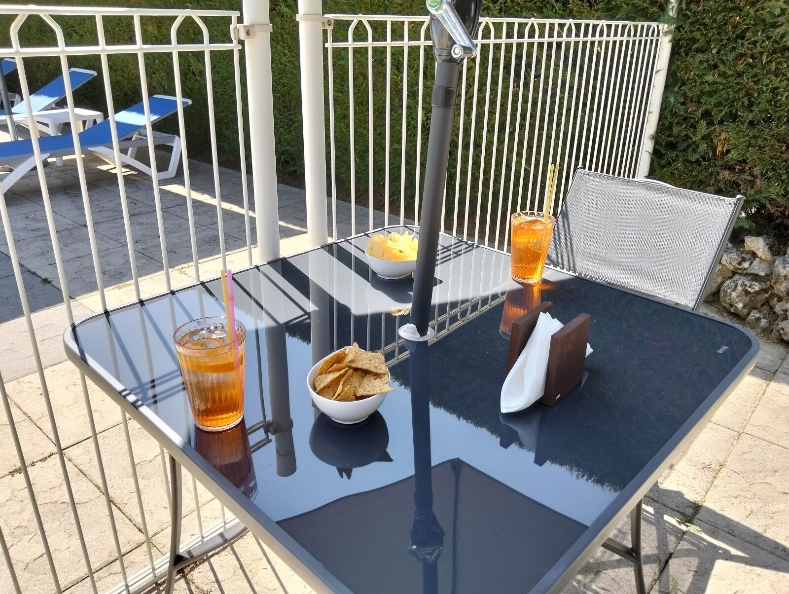 seasonal outdoor pool, open 10:30 am to 5:30 pm, pool umbrellas