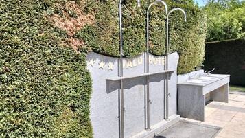 Seasonal outdoor pool, open 10:30 AM to 5:30 PM, pool umbrellas