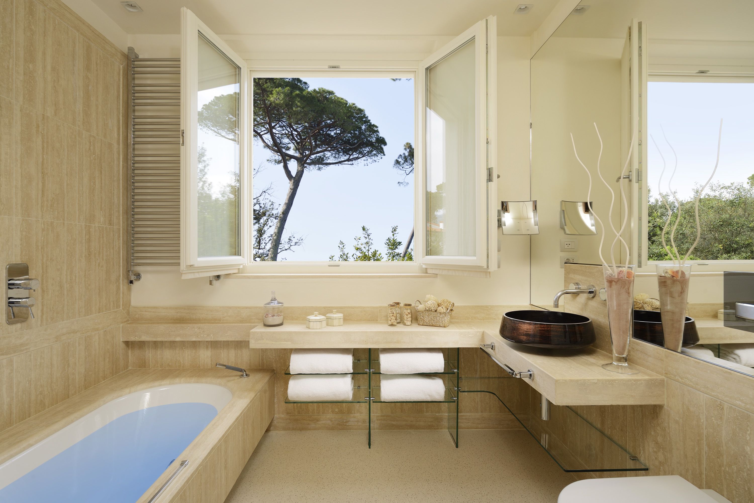 deluxe suite | bathroom | shower, designer toiletries, hair dryer, bathrobes