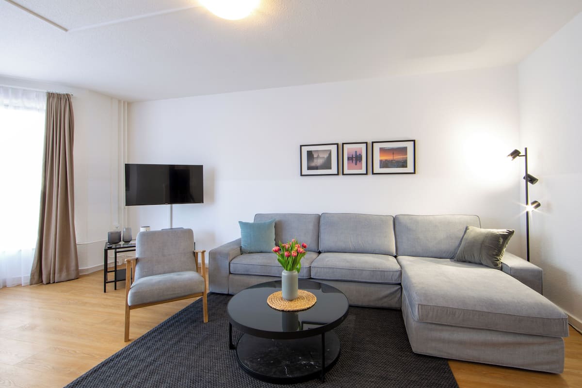 Superior Apartment, 3 Bedrooms | Living area | Flat-screen TV