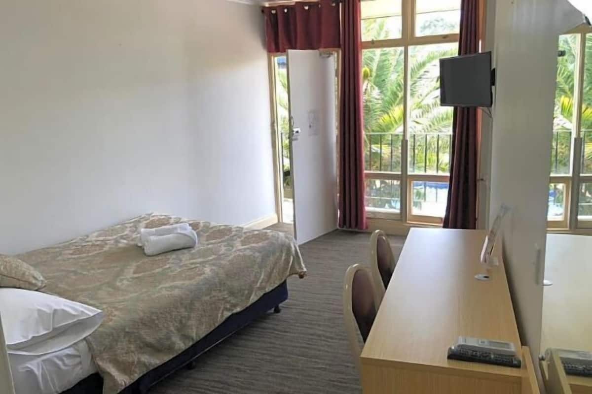 Desk, laptop workspace, free WiFi, bed sheets